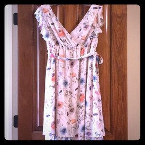 Knee length maternity dress.